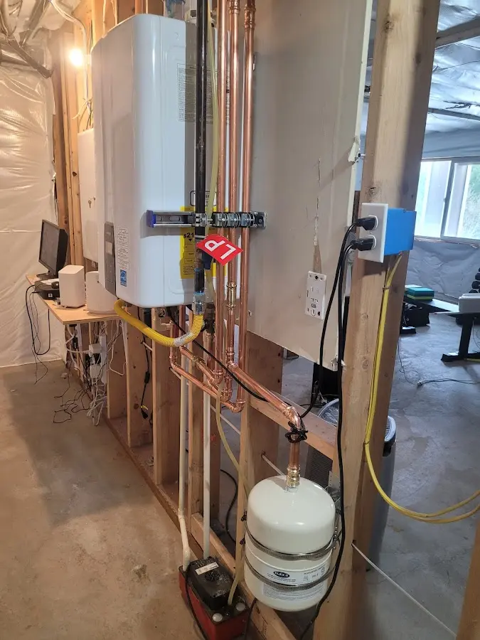 Licensed plumber repairing a kitchen sink in Lyndhurst